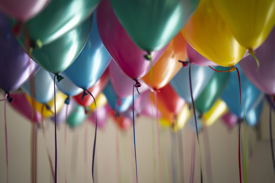Colorful balloons at a party covered by event insurance