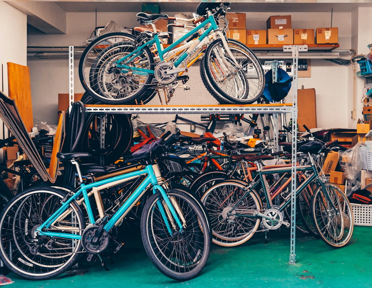 Bicycles displayed on racks in a bike shop