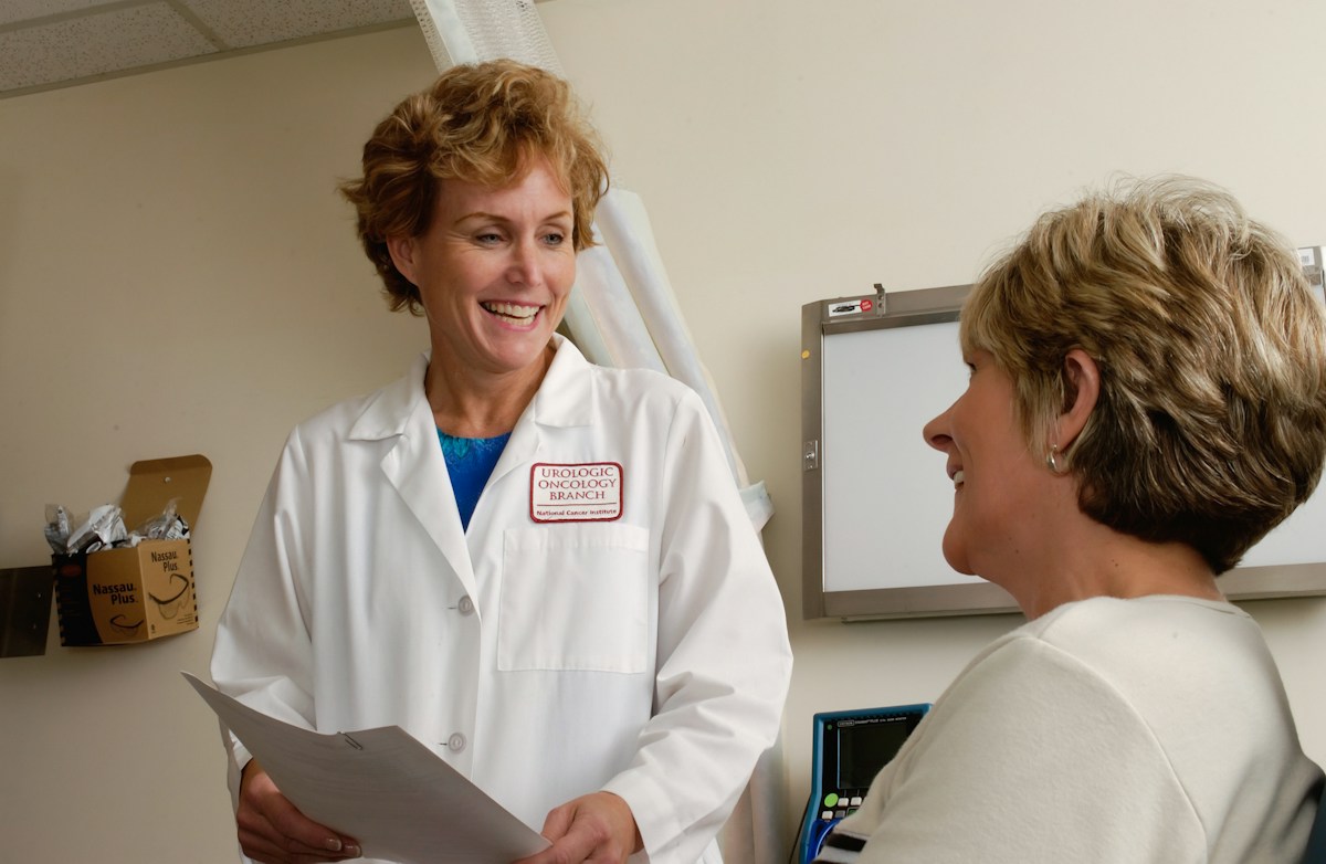 A doctor talking to a patient in a clinic