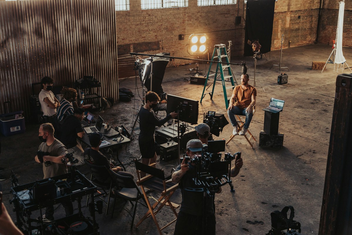 Film crew standing around a camera setup