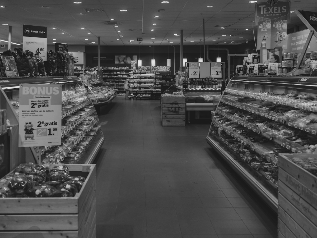 Grocery store aisle with food on shelves