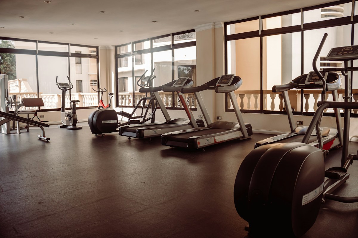 A fitness center with treadmills and exercise machines