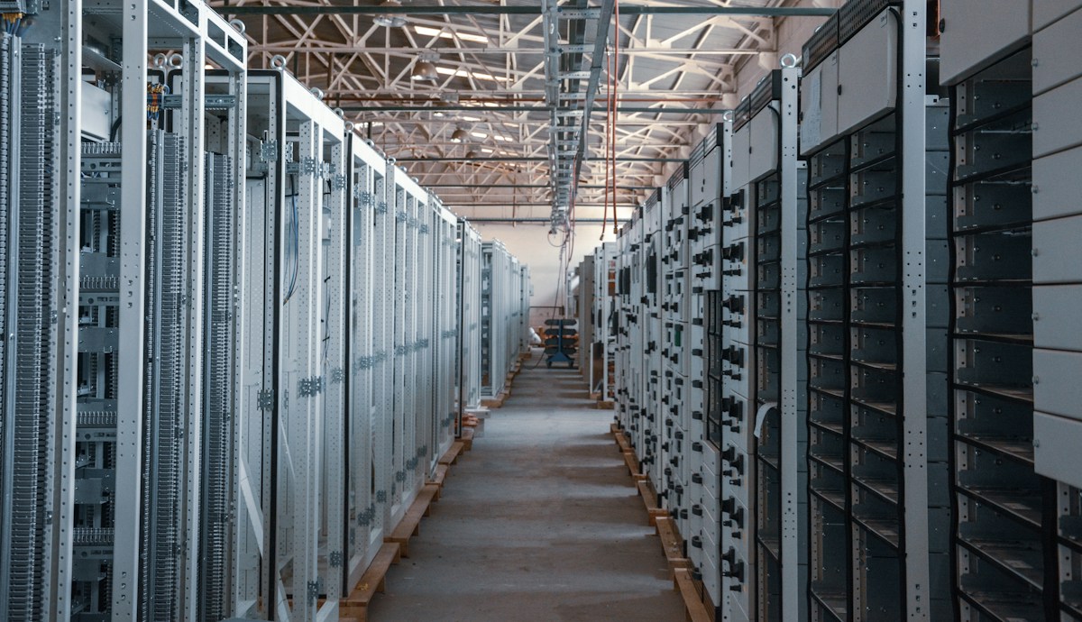 Data center aisle with server racks