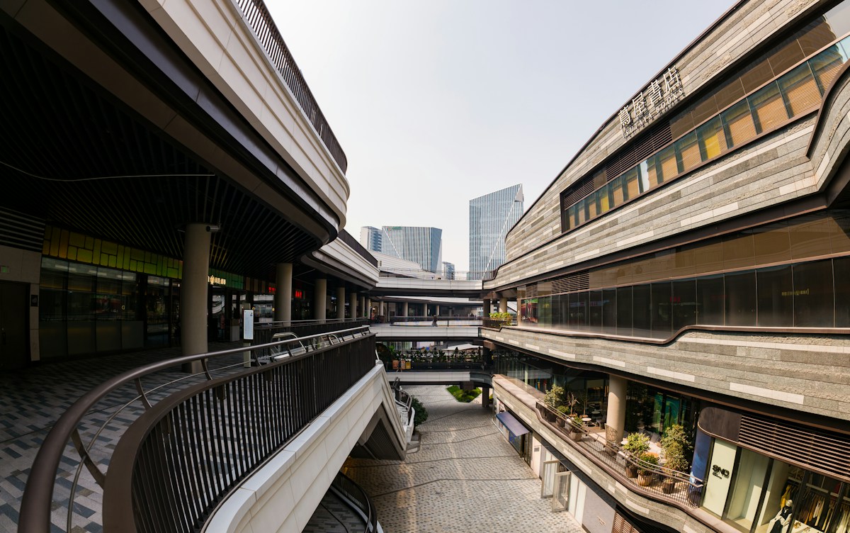 An outdoor shopping center on a sunny day