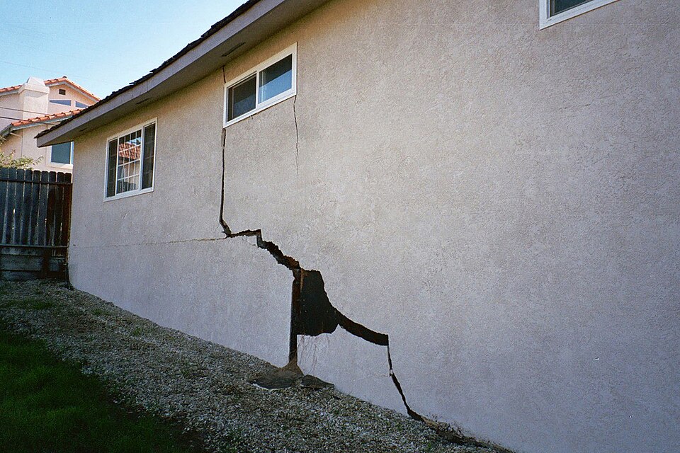 Home knocked off its foundation by an earthquake
