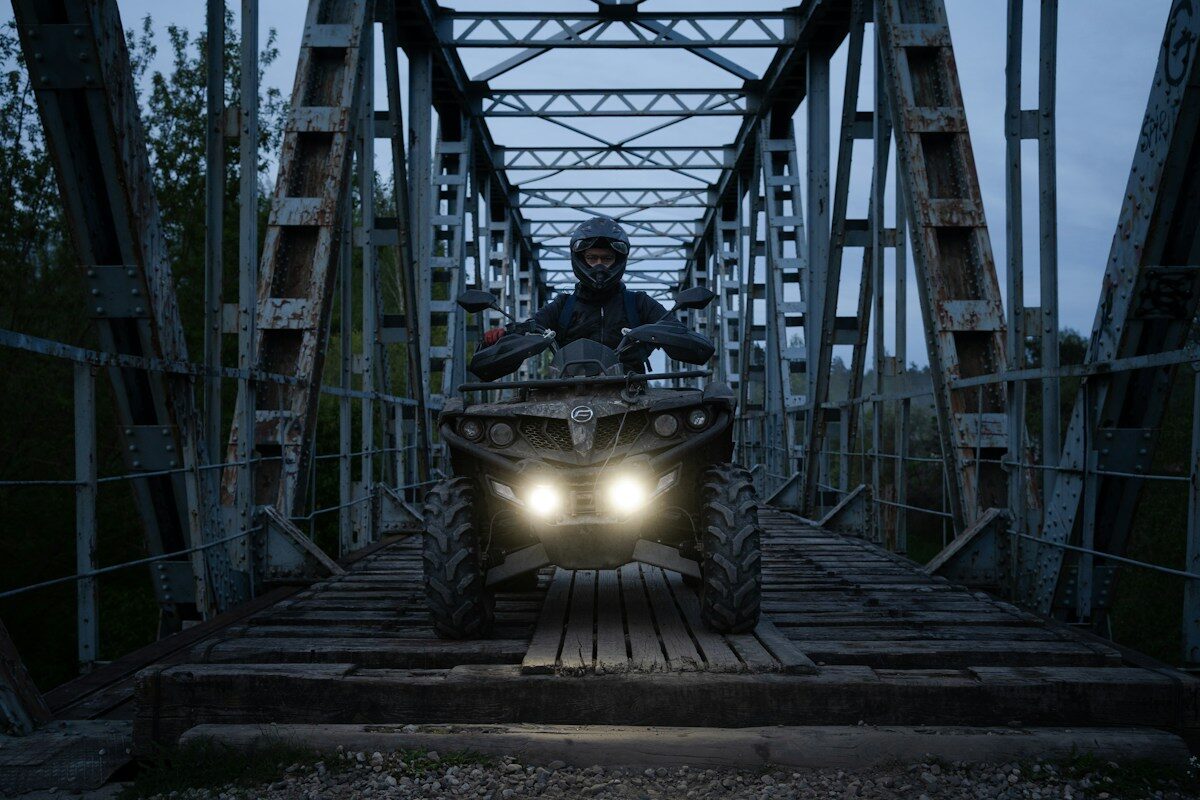 ATV crossing a bridge