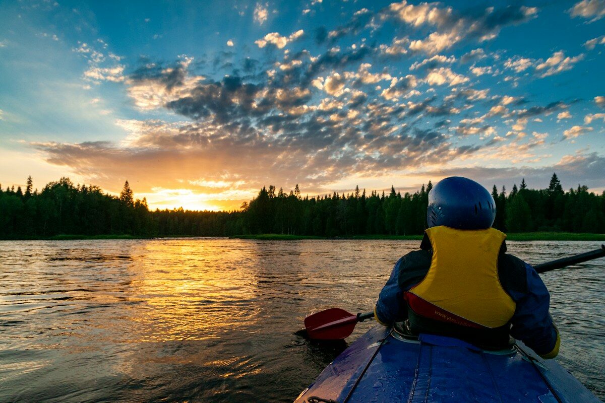 Kayak on a lake at sunset